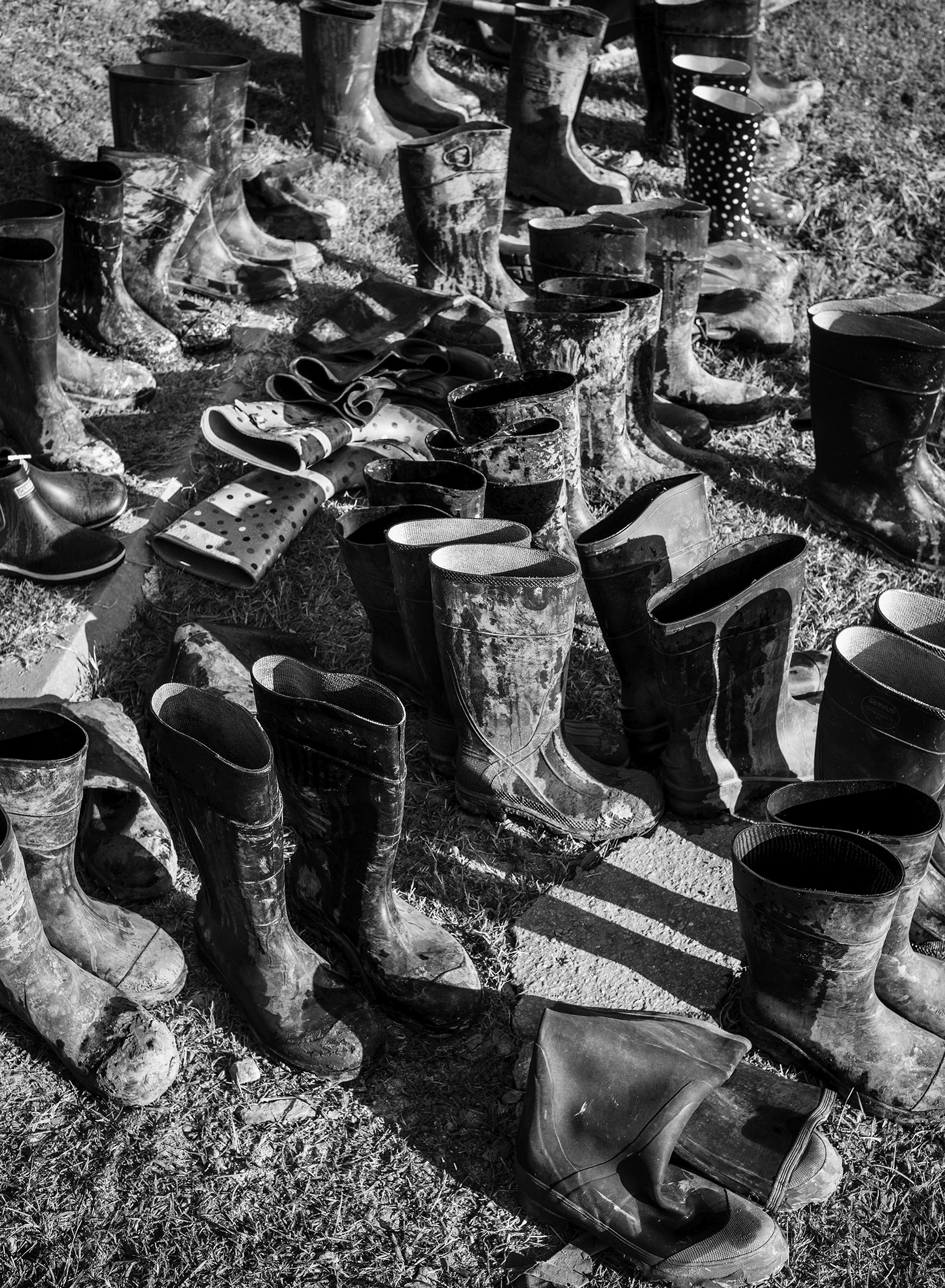 Pairs of muddy boots