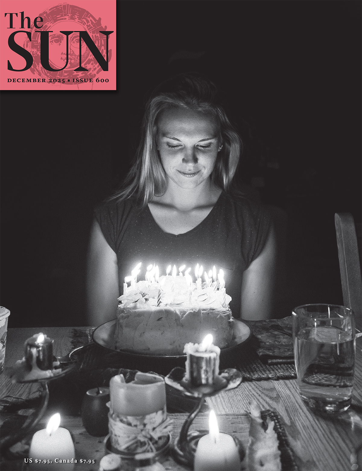 The photographer’s wife on her twenty-third birthday ready to blow out candles on her cake