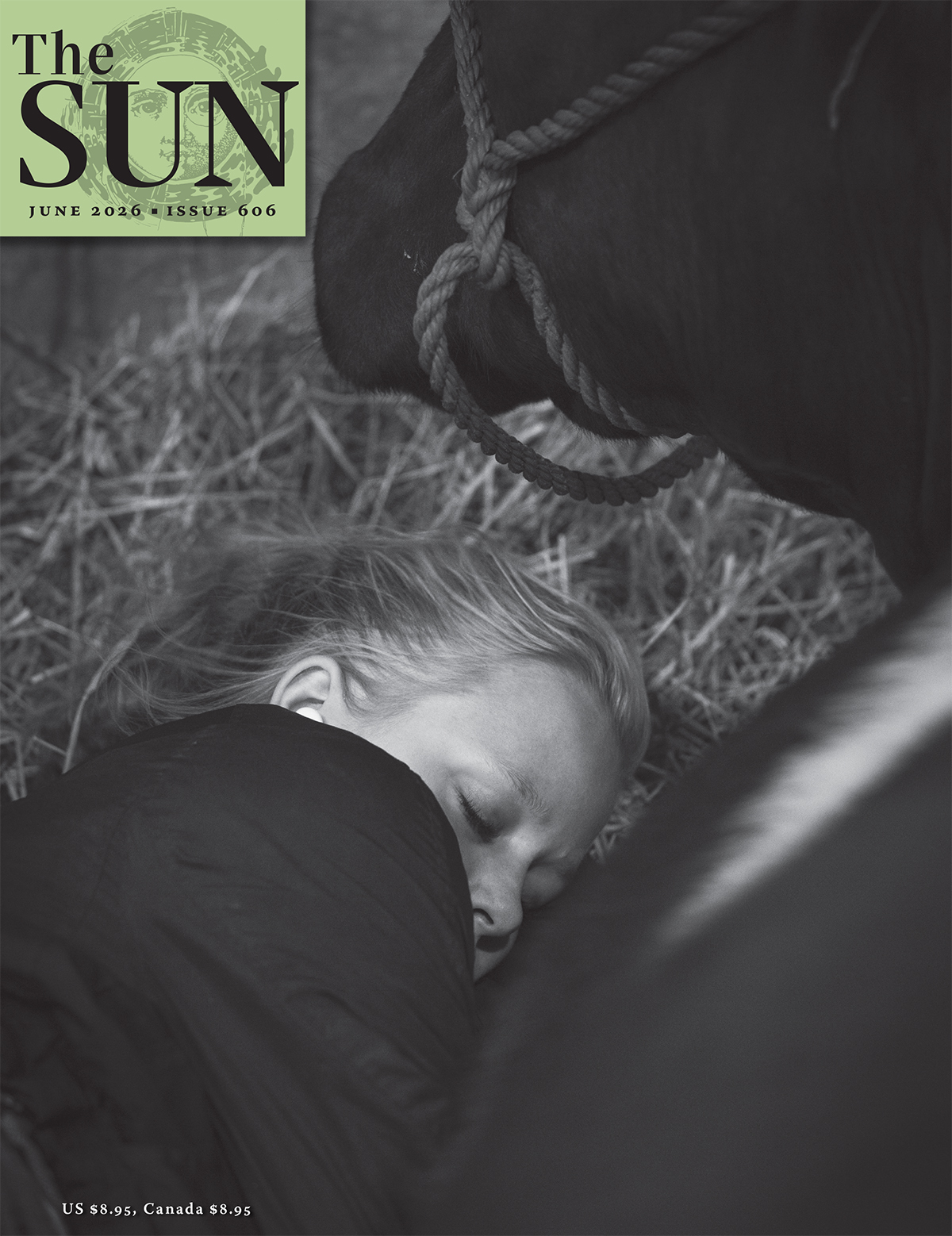 The Sun Magazine June 2026 cover showing a girl sleeping next to a cow