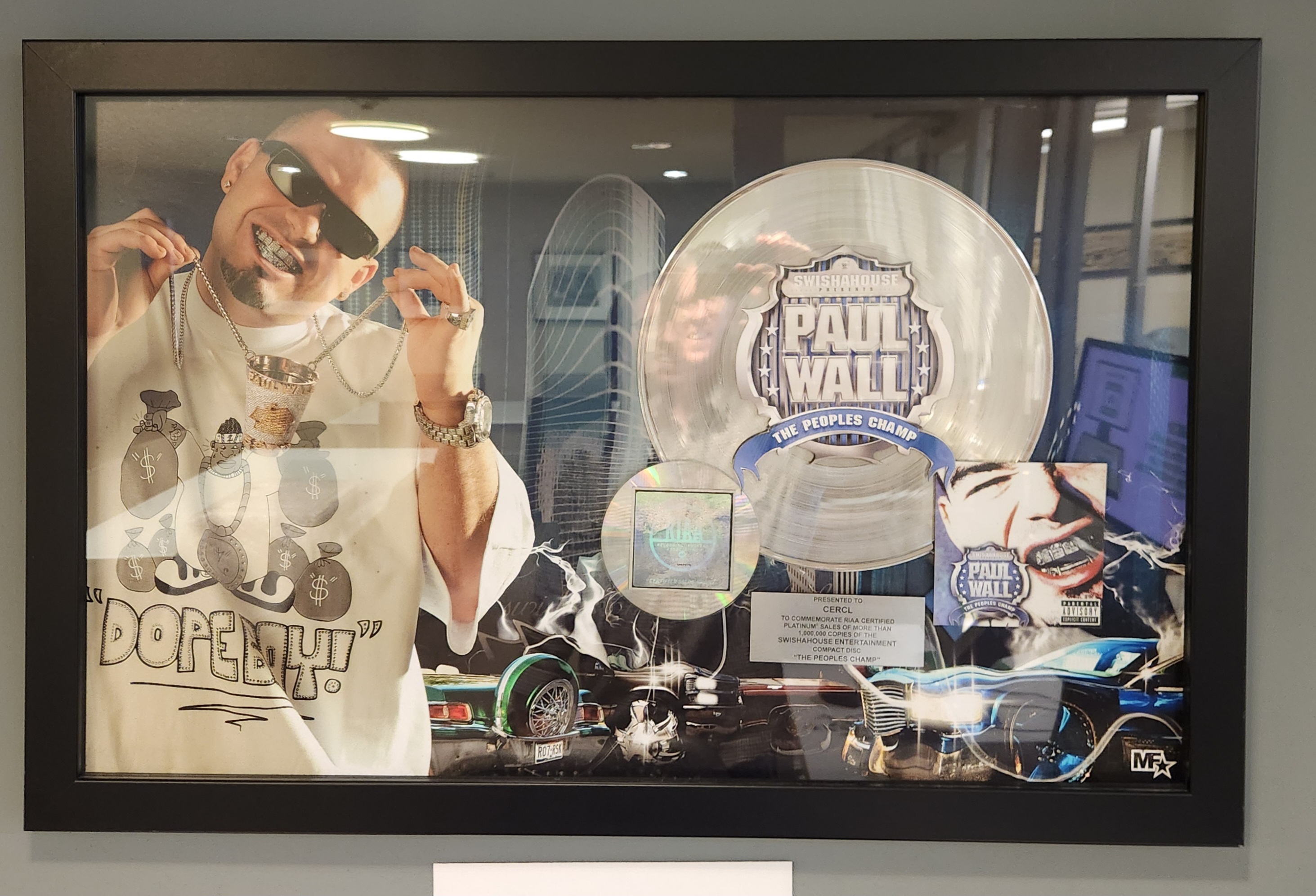 Texas is proud of its Texans. (That’s me reflected in the record.)