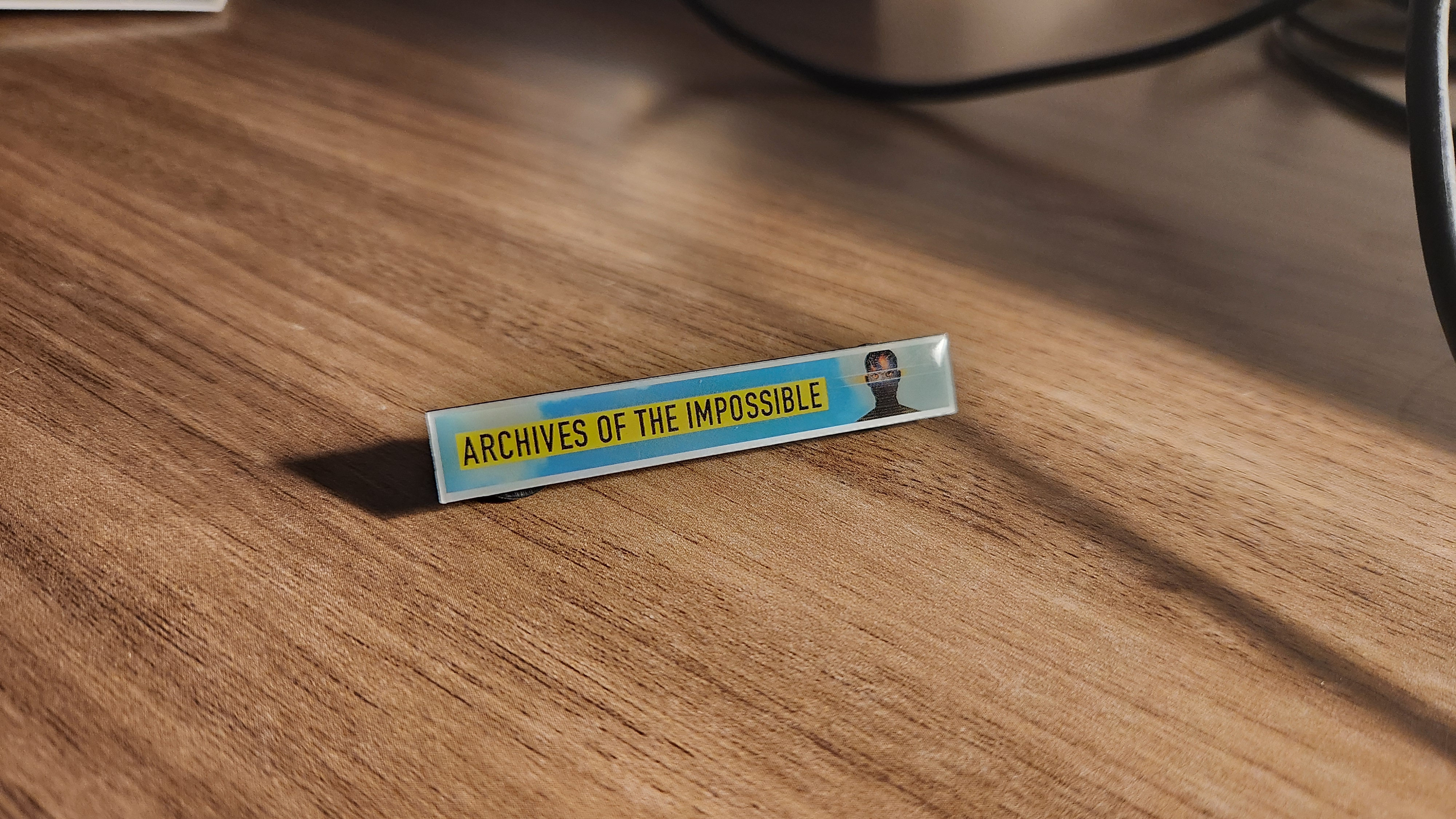 I visited the Archives of the Impossible, and all I got was this enamel pin.