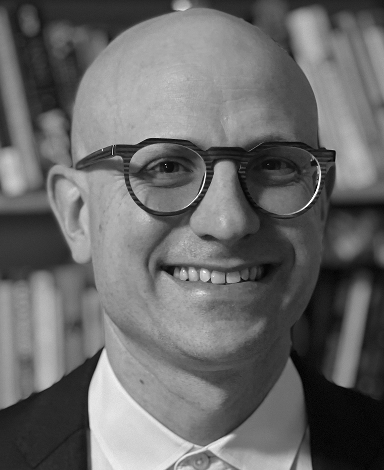 A photograph of Eric Tars.